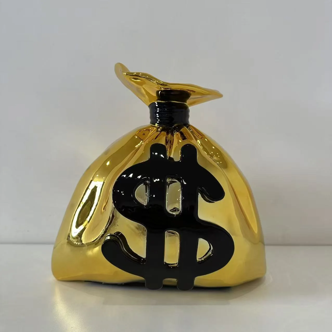 Gold Money Bag Sculpture